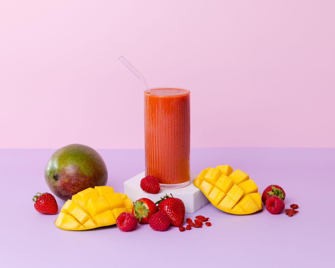 Healthy smoothie made with Vitality ready-to-blend pack and ingredients on table